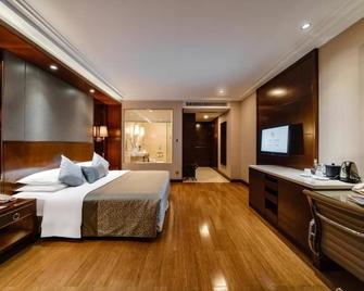 โรงแรมโกลเดนอีเกิลซัมมิทคุนหมิง - คุนหมิง - ห้องนอน