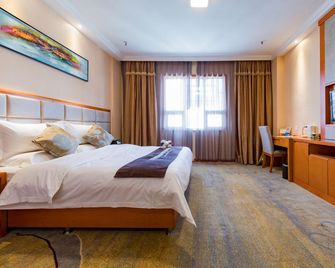 Likelai Hotel (Qingdao Licun Metro Station) - צ'ינגדאו - חדר שינה