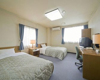 Business Hotel Art Plaza - Ота - Спальня