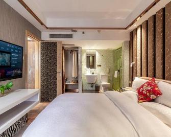Count Garden Hotel - Qiannan - Habitación