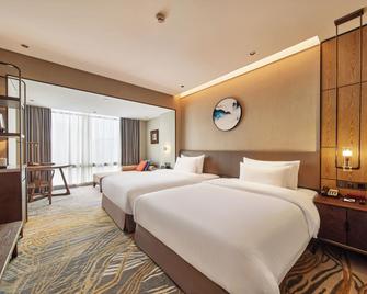 Dong Fang Hotel Guangzhou - Guangzhou - Bedroom