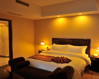 Jinjiang Jinqiao Hotel - Ляншань - Спальня