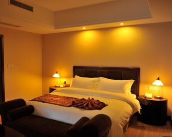 Jinjiang Golden Bridge Hotel - Liangshan - Bedroom