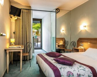 Logis Hôtel Restaurant Le Mont Aigoual - Meyrueis - Спальня