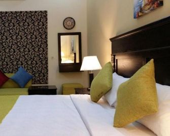 Islamabad Royal Inn - Islamabad - Camera da letto