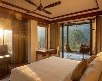 Niraamaya Retreats Samroha Athirappilly - Vettilappara - Habitación