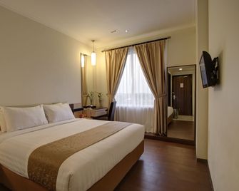 Hotel Dafam Pekalongan - Pekalongan - Спальня