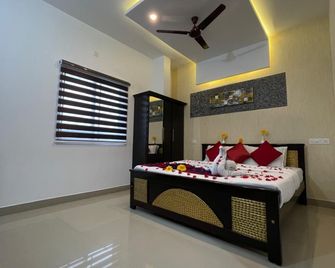 Cofiya Hotel - Madikeri - Спальня