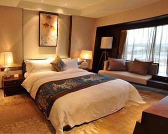 Vipu Hotel - فوشان - غرفة نوم