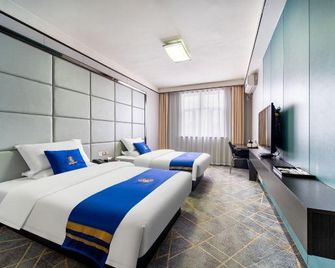 Super 8 by Wyndham Urumqi Nan Hu Lu - Ürümqi - Habitación