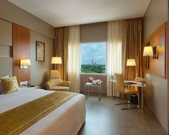 Royal Orchid Central Vadodara - Vadodara - Bedroom