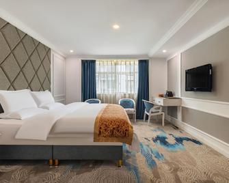 Shaoxing Hotel - Guiyang - Slaapkamer