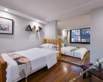 Jiuqi · Hetangyueshe Boutique Hostel - Xiangxi - Bedroom