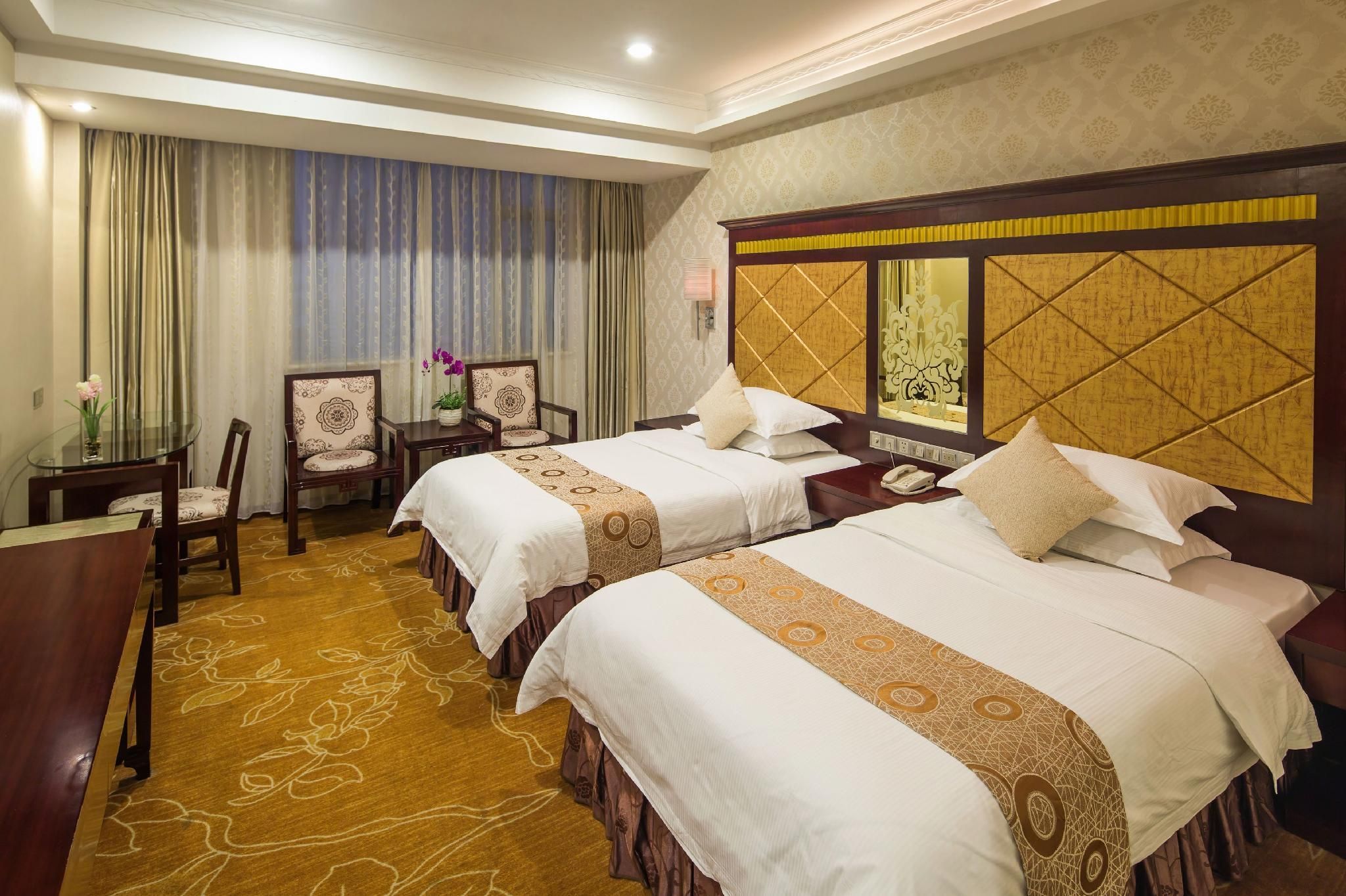 Jinyatai Business Hotel - גואנגג'ואו - חדר שינה