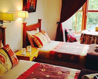 Magnolia Place Guest Houses - סטלנבוש - חדר שינה