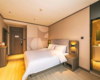Hanting Hotel Qingdao Railway Station West Square - Qingdao - Bedroom