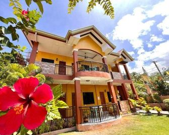 Sangi Tourist Inn near Kawasan Badian Canyoneering - Alegria - Gebäude