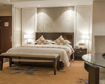 Hangzhou Huachen Fengting Hotel - Hangzhou - Habitación