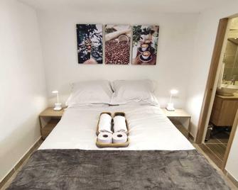 Enjoy this comfortable apartment with WIFI in the charming Manizales. In Milan! - Manizales - Habitació