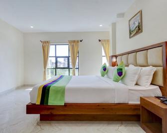 Treebo The Meridian - Chikamagalur - Bedroom