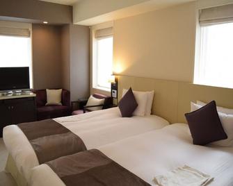 Hotel Trusty Kobe Kyukyoryuchi - Kobe - Bedroom