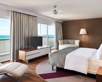 لو ميريديان نوميا ريزورت آند سبا - نوميا - غرفة نوم