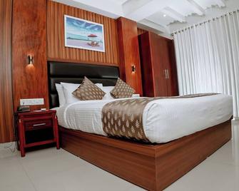 Queens Hotel - Kozhikode - Habitación