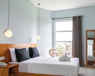 Coco & Pineapple Pants Hostel - North Kuta - Schlafzimmer