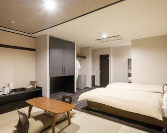 The Premium Hotel in Rinku - Izumisano - Schlafzimmer