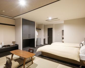 The Premium Hotel in Rinku - Izumisano - Schlafzimmer
