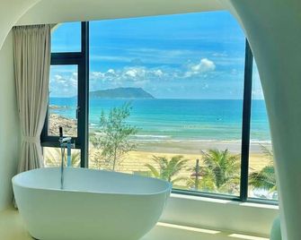 Nirvana Seaview Homestay - Wanning - Ložnice