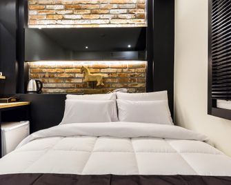 شينشون هوتل لودي - سيول - غرفة نوم