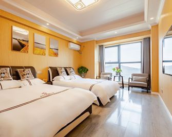 Nanjing E Nationality Apartment (Xianlin University Town Wanda Mao) - Nanjing - Quarto