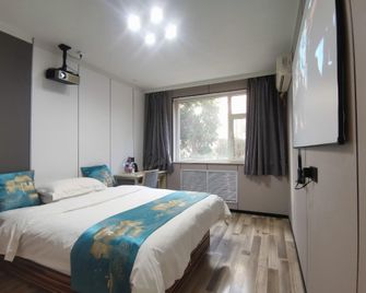 Meijing Express Hotel - Jincheng - Ložnice