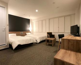Kusatsu Daiichi Hotel - Kusatsu - Bedroom