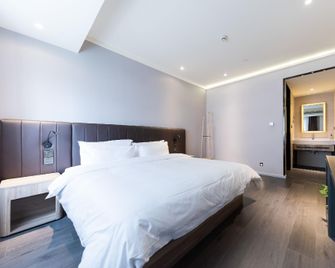 Hanting Premium Hotel Hefei Qingxi Road Anhui Agricultural University - Hefei - Bedroom