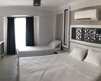 Del Mar Hotel - Бозджаада - Спальня