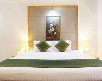 Treebo Edha Suites Koramangala - Bengaluru - Bedroom
