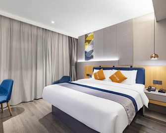 Home Inn Style Golden Nanjing Xinjiekou Metro Station - نانجينغ - غرفة نوم