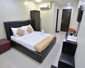 Amax Inn Makati II - Makati - Schlafzimmer
