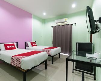 OYO 1163 Eden Hostel - עיירת פוקט - חדר שינה