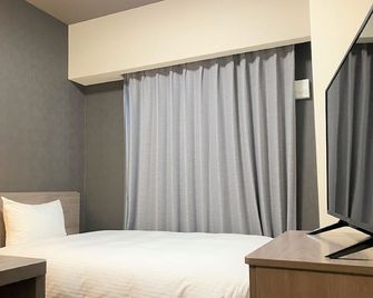 Hotel Route Inn Shikoku Chuo - Mishimaka - Shikokuchuo - Bedroom