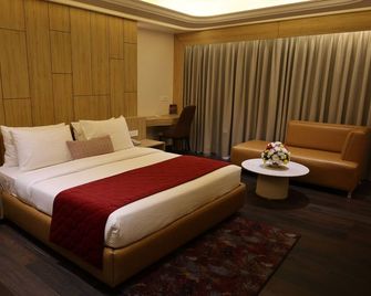 The Mahanta Boutique Hotel and Resort - Meerut - Slaapkamer