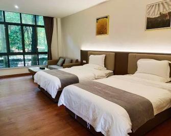 Zhangfei Gudao Holiday Hotel - Chongqing - Bedroom