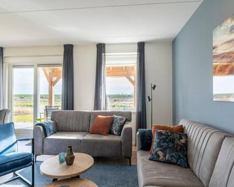 Holiday home with south facing garden - Scherpenisse - Sala de estar