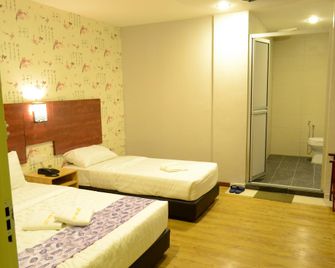 City View Hotel Sepang - ספאנג - חדר שינה