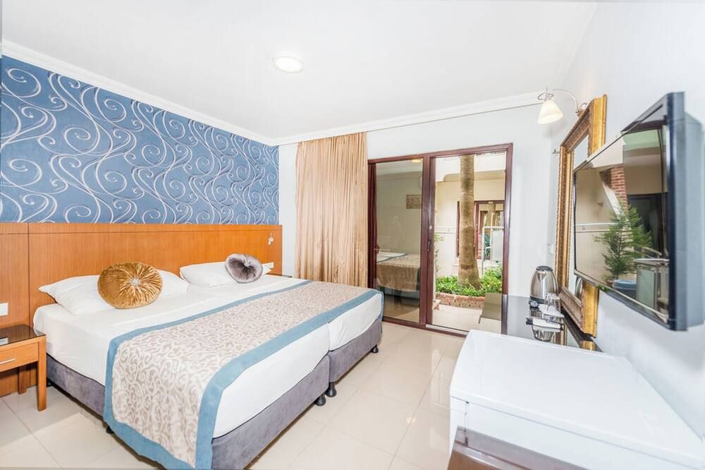 Tropic Beach Club & Resort - Side - Side - Soverom