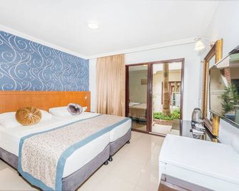 Tropic Beach Club & Resort - Side - Side - Soverom