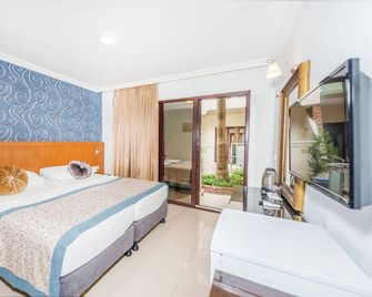 Tropic Beach Club & Resort - Side - Side - Soverom