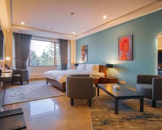 Roomy Signature Hotel, Islamabad - Islamabad - Schlafzimmer